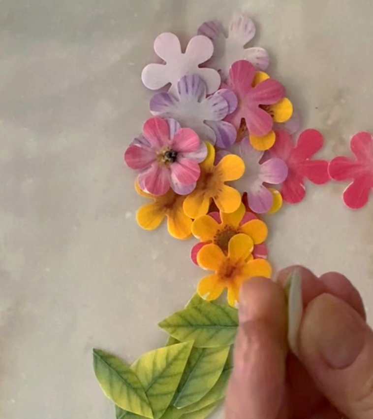 Make flowers and leaves out of SmArt Sheets from Icing Images.